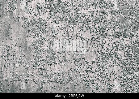 Surface of the old metal wall is covered with a lot of cracks. Destruction of the old cracked paint. Grunge background texture. Stock Photo