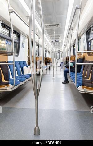 Almost empty train seats of St. Petersburg subway train during coronavirus pandemic. Strong decrease in passenger traffic in public transport due to q Stock Photo