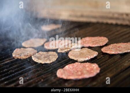 cooking meatballs on the grill. Grilling meatballs on the grill. Turkish cuisine. Stock Photo