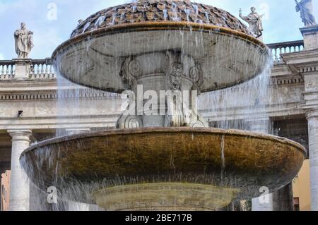 Water flowing from Fountain in St. Peters Square Stock Photo