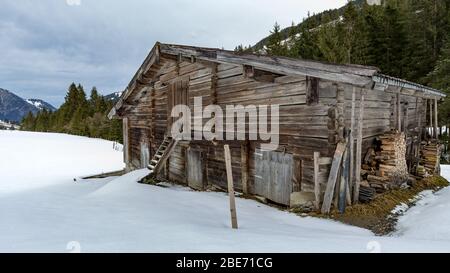 old barn in a rural alpine landscape Stock Photo