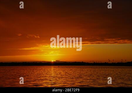 Brilliant Awe-Inspiring Sunset over the St. Johns River in Vilano Beach, Florida Stock Photo