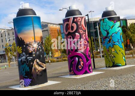 Giant Spray Cans as a street art installation in Christchurch, New Zealand. Stock Photo