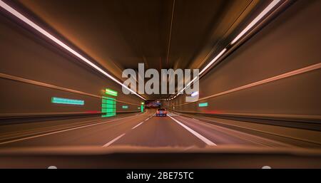 tunnel car motion blur night traffic fast Stock Photo