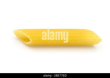 Homemade penne pasta on white isolated background in closeup macro top view. Penne look like tube and have yellow color. Pasta is delicious Italian tr Stock Photo