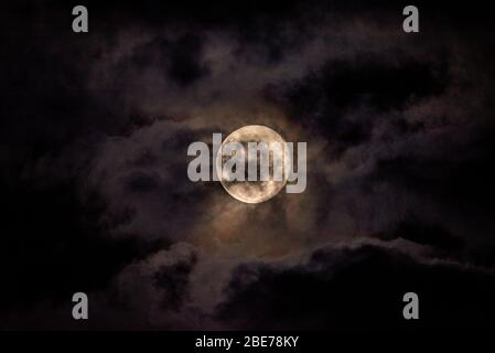 Full Moon on a Cloudy Night Stock Photo