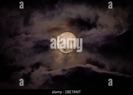 Full Moon on a Cloudy Night Stock Photo