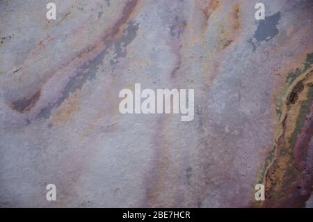 Dark gray quartz, saturated natural pattern of polished stone close-up. Background, texture. Stock Photo