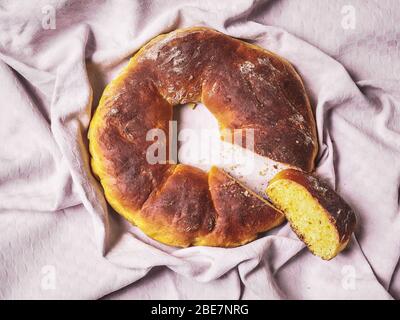 Cuzzupa Easter cake from Calabria, south italian rustic poor cake hand made on top view composition Stock Photo