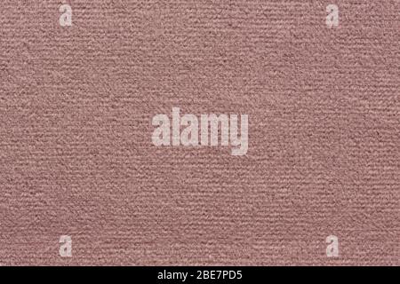 Soft textile background in light pink hue. Stock Photo