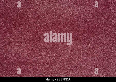 Saturated wine-coloured tissue background. High quality texture in extremely high resolution. Stock Photo