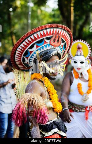 dancers of kathakali dancer,theyyam,thira,folk dancers,celebration,kerala festival,indian festival dancers,dance form india, Stock Photo