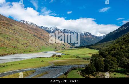 Matukituki River, snow covered mountains, Mount Aspiring National Park, Otago, South Island, New Zealand Stock Photo