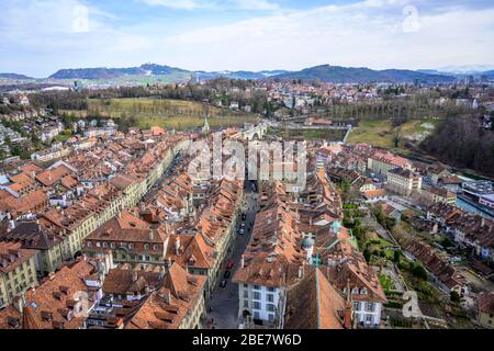 View from Bern Cathedral to the red tiled roofs of the houses in the historic centre of the old town, city view with surrounding countryside, Inner Stock Photo
