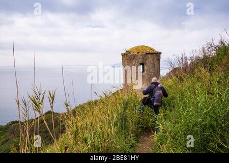 Bacoli (Naples, Italy) - The trekking path along Miseno coast starts next to the lighthouse and allows you to enjoy a breathtaking view of the horizon Stock Photo