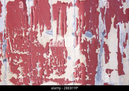 Old weathered natural wooden backgound with paint flakes. Stock Photo