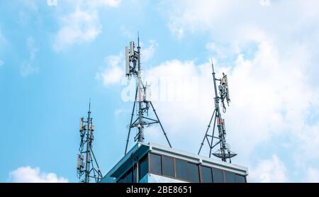 Cellular base station network antenna, air pollution and environment pollution idea photo Stock Photo