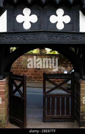 The front gate entrance of Where the St Peters Church in Woolton Village Liverpool. Where John Lennon and Paul Mccartney first played together Stock Photo