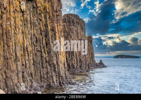 Stunning basalt column rock formations, Stykkisholmur harbor, Snaefellnes peninsula, Iceland Stock Photo