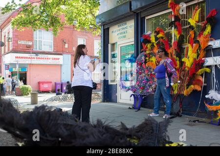 Granby Street in Liverpool, L8, also known as Toxteth has a colorful and vibrant community spirit. Liverpool. England Stock Photo