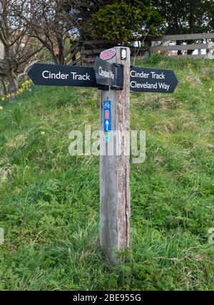 Signpost near Robin Hoods Bay, Narth Yorkshire for the Cleveland Way long distance footpath, Cinder Track and National cycle network Stock Photo