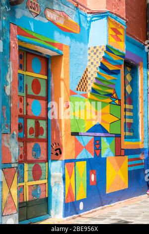 Burano, Italy - April 23, 2017: Detail of a colorful house on the island of Burano in the Venetian lagoon. Stock Photo