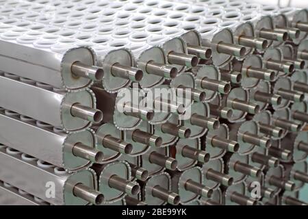 close up of pictures, solar water heater parts stacked together, not yet been assembled, in a professional manufacturer, Tangshan, Hebei Province, Chi Stock Photo