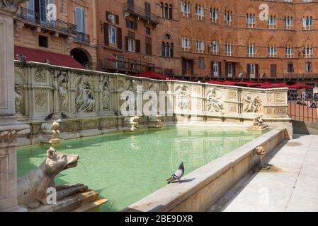 SIENA, ITALY MAY 25, 2017: Fonte Gaia fountain of joy , with the Virgin Mary and baby Jesus. Piazza del Campo Campo square . Stock Photo