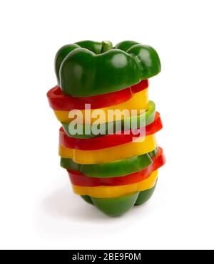 Colorful bell peppers slices on white background Stock Photo