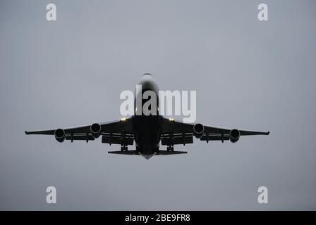 Airplane landing at Heathrow Stock Photo