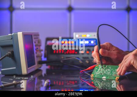 PCB witch microcontroller in electronics laboratory Stock Photo