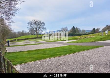 Caravan and motorhome/RV park closed due to the Coronavirus/Covid 19 pandemic showing a lack of caravans and motorhomes Stock Photo