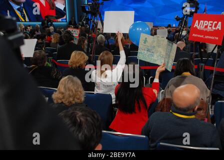 Journalists and media members attend President of the Russian Federation Vladimir Putin's annual press conference at World Trade Center Stock Photo