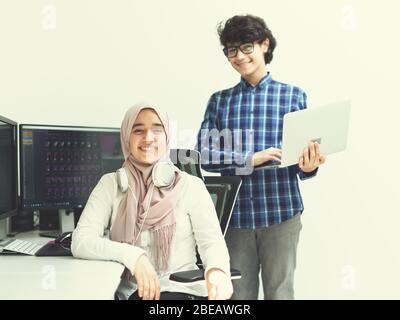 startup business, young creative professionals people team discussing  on meeting at bright office while pointing on dual monitor screen computer for Stock Photo
