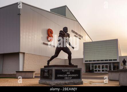 Syracuse, New York, USA. April 12, 2020. Floyd Little statue in front of the Clifford J. Ensley Athletic Center in Syracuse, New York Stock Photo