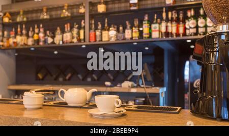 Stylish restaurant in a loft style, bar with tea set Stock Photo