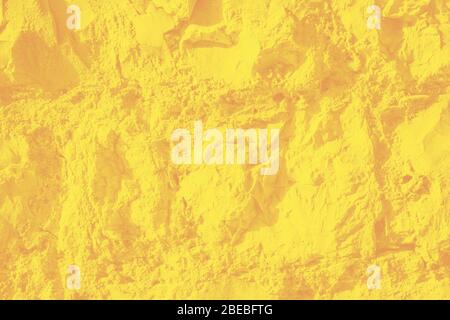 Wall sandstone texture background. Yellow surface, stone vintage texture. Voluminous background, toned Stock Photo