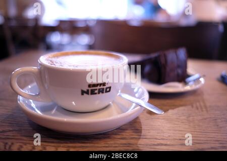 LONDON- MARCH, 2019: Interior shot of Caffe Nero coffee and cake. A large chain of high street Italian style coffee shops based in London Stock Photo