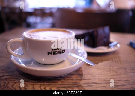 LONDON- MARCH, 2019: Interior shot of Caffe Nero coffee and cake. A large chain of high street Italian style coffee shops based in London Stock Photo