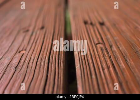 Wood grains visible from weathered pitch pine boards painted brown Stock Photo