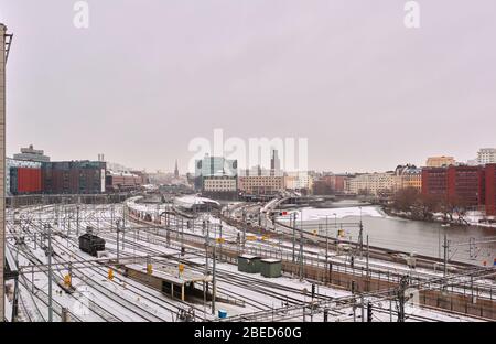 Railroad tracks in Stockholm, Sweden, viewed from Barnhusbron during a winter morning Stock Photo
