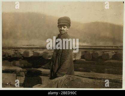 Harley Bruce. a young coupling-boy at tipple of Indian Mountain Mine, of Proctor Coal Co., near Jellico, Tenn. He appears to be 12 or 14 years old, and says he has been working there about a Stock Photo