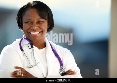 Portrait of a smiling female doctor. Stock Photo