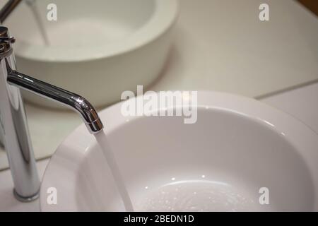 Modern bathroom in luxury apartment.Toothbrush cups close-up. Stock Photo