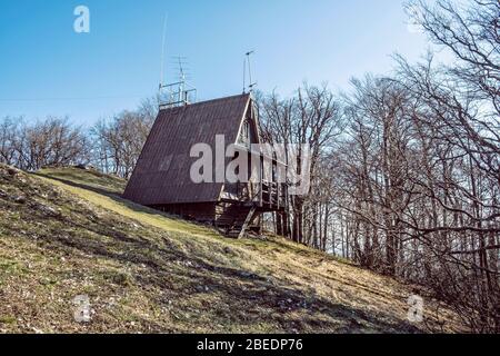 Wooden cottage, Chmelova hill, Vrsatske rocks, White Carpathian mountains, Slovak republic. Hiking theme. Stock Photo