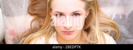 Good-looking lady in white sweater Stock Photo