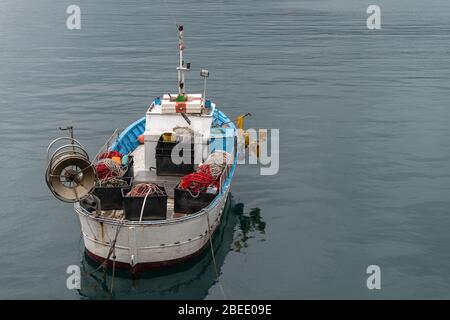 High angle view of fishing boat moored in the small port of Imperia, Liguria, Italy Stock Photo