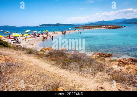 Tavolara, Sardinia / Italy - 2019/07/18: Panoramic view of Spiaggia Spalmatore di Terra beach of Isola Tavolara island on Tyrrhenian Sea Stock Photo