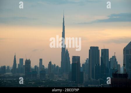 DUBAI - NOVEMBER 15: View over Dubai with Burj Khalifa the tallest building in the world reaching over 800 meters under construction, November 15, 201 Stock Photo