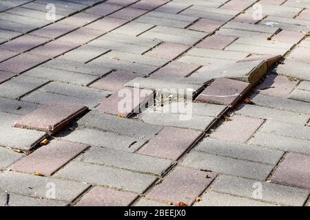 defective cobblestone pavement due to incorrectly prepared base Stock Photo